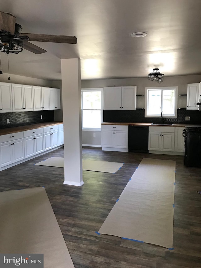 kitchen with black appliances, white cabinetry, plenty of natural light, and ceiling fan