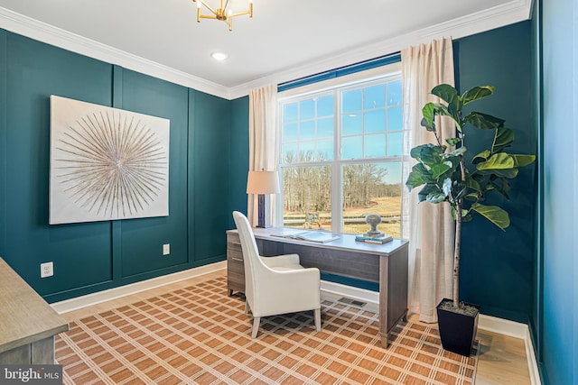 home office with plenty of natural light and ornamental molding