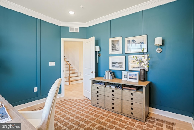 home office featuring crown molding