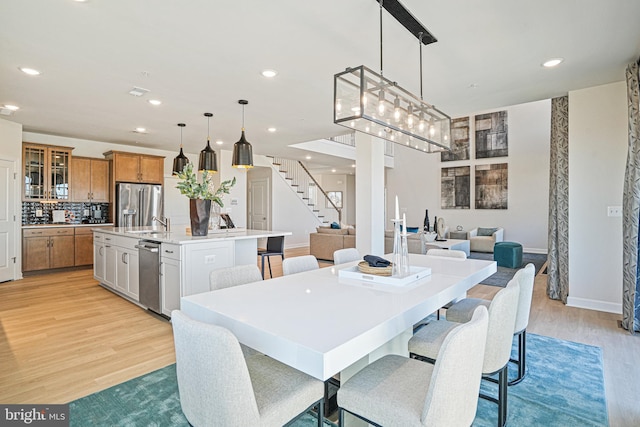 dining room with light hardwood / wood-style floors