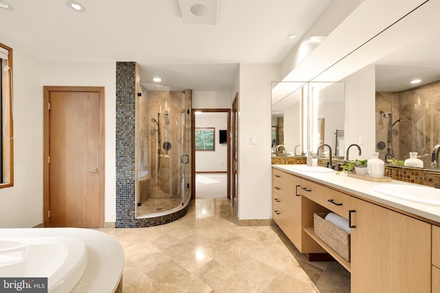 bathroom with vanity and walk in shower