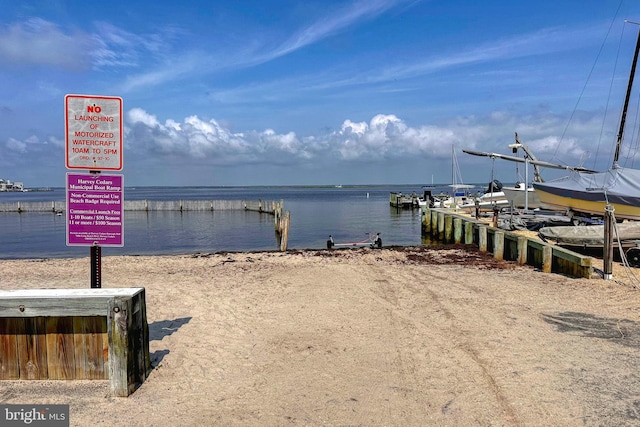 view of dock with a water view