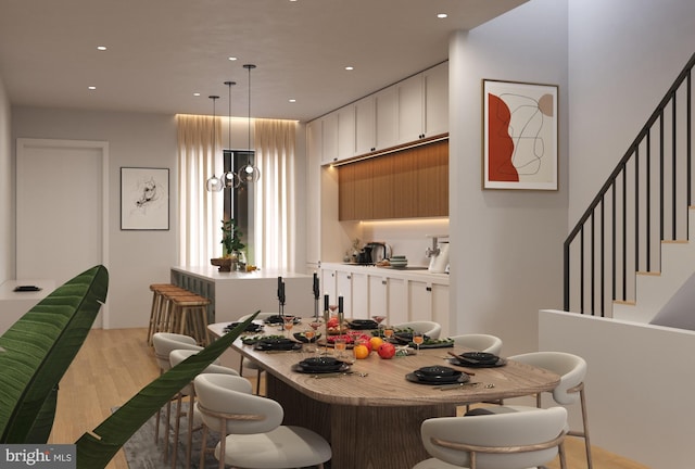 dining room featuring light hardwood / wood-style floors