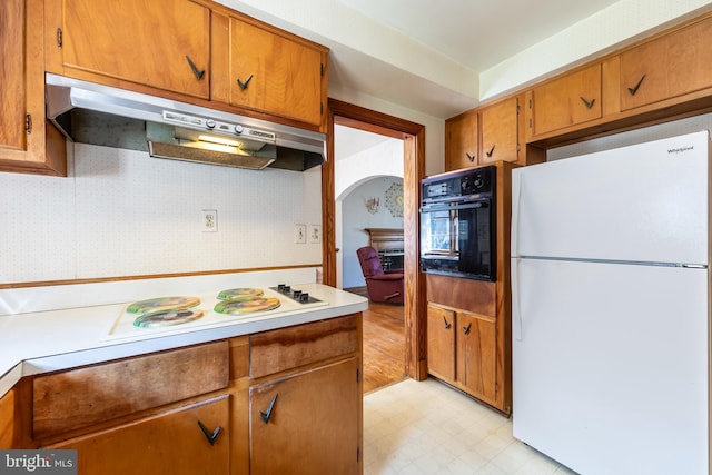 kitchen featuring white appliances