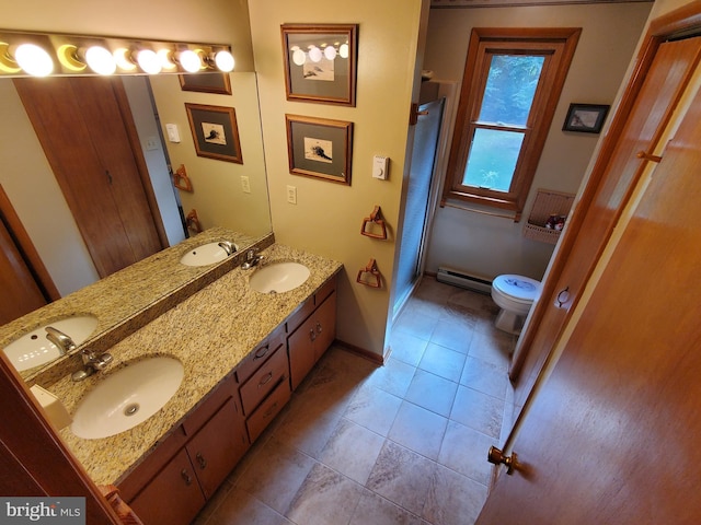 full bathroom with a sink and a baseboard radiator