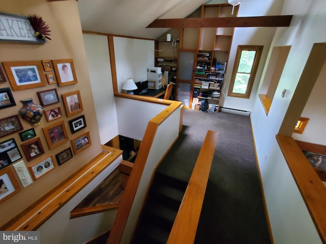 stairs with vaulted ceiling and carpet floors