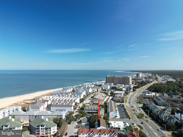 aerial view featuring a water view and a view of the beach