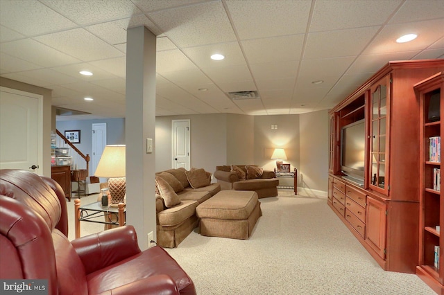 living room featuring recessed lighting, visible vents, baseboards, and light colored carpet