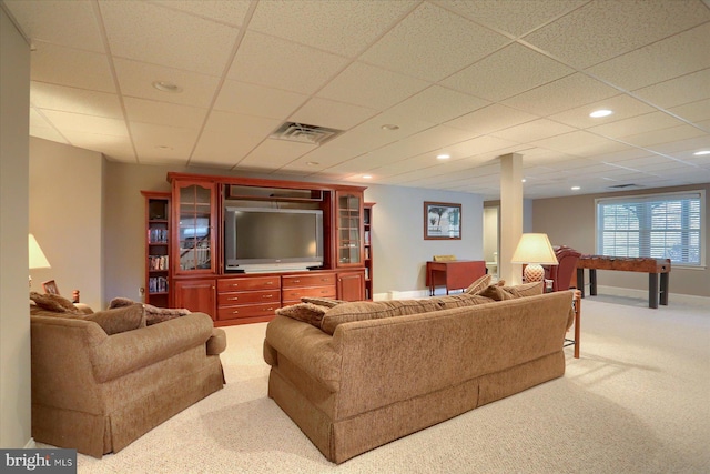 living area featuring a paneled ceiling, recessed lighting, carpet flooring, visible vents, and baseboards