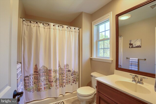 full bath with toilet, visible vents, shower / bath combination with curtain, and vanity