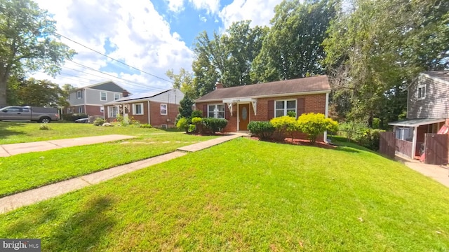 view of front of property featuring a front yard