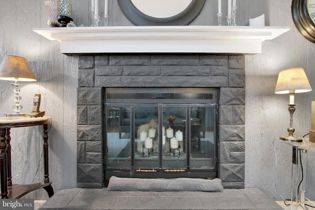 interior details featuring a fireplace