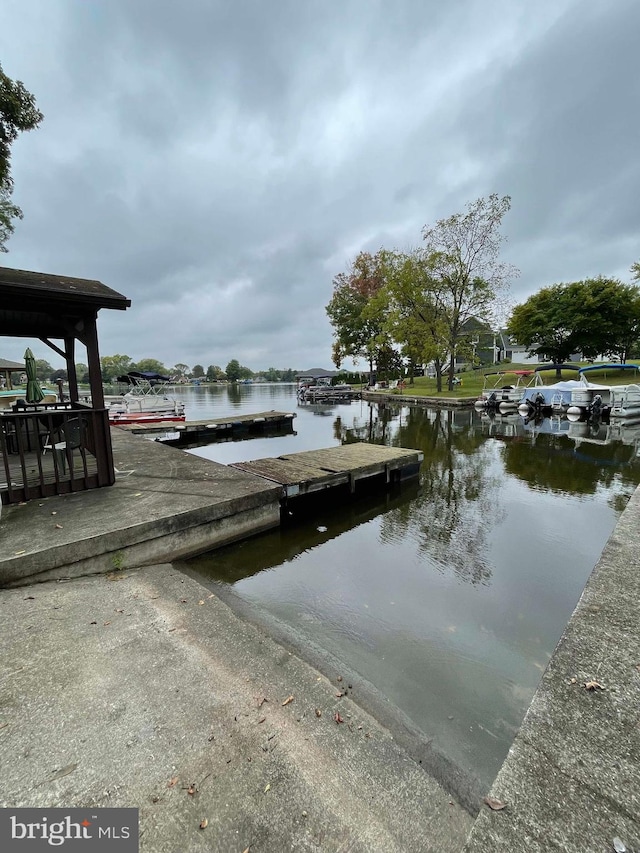 view of dock with a water view