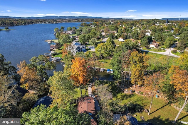 aerial view featuring a water and mountain view