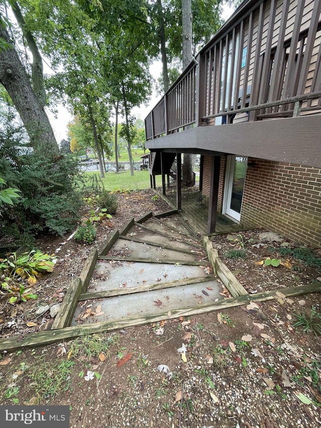 view of yard featuring a wooden deck