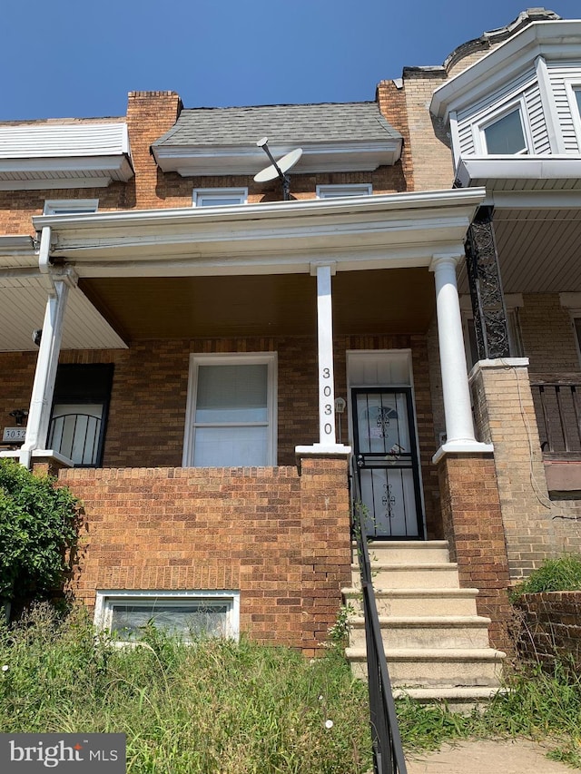 view of front facade featuring covered porch