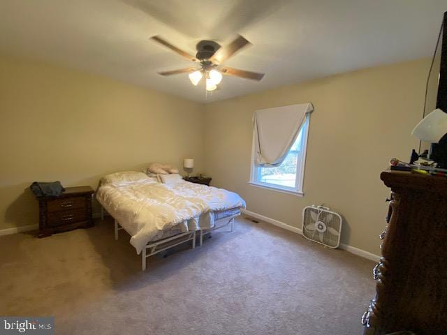 bedroom featuring carpet flooring and ceiling fan