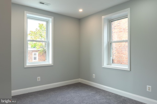 empty room featuring carpet floors