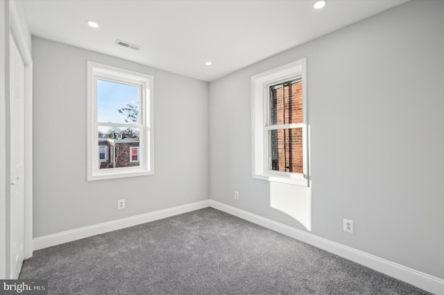 unfurnished room with carpet