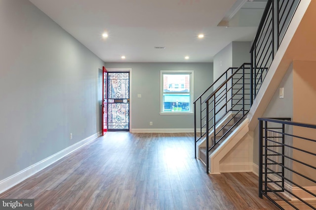 foyer with hardwood / wood-style flooring