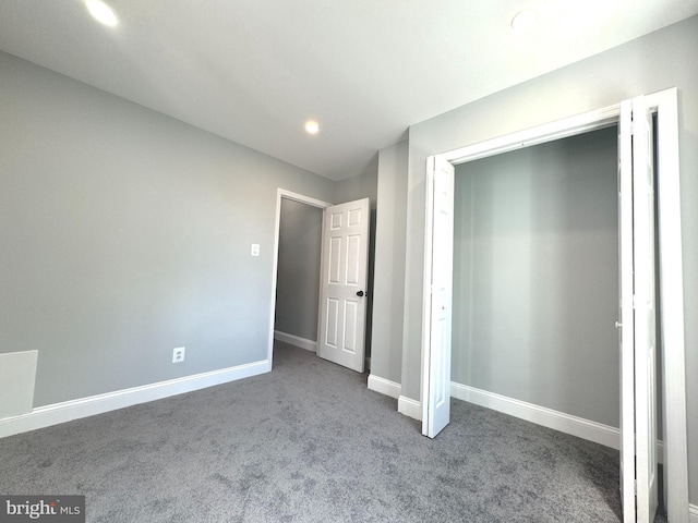 unfurnished bedroom featuring carpet flooring