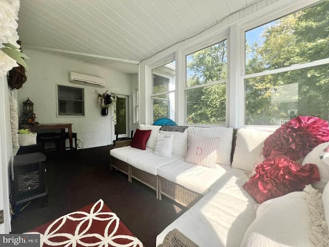 sunroom / solarium with a wall mounted AC