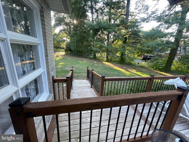 deck featuring a yard