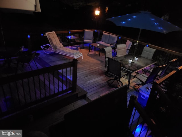 view of deck at twilight