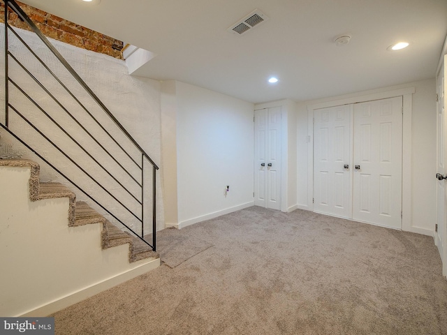 basement with carpet flooring