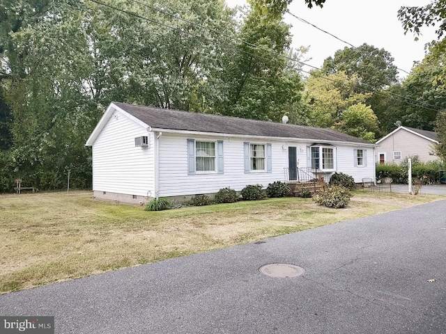 view of front of property with a front lawn