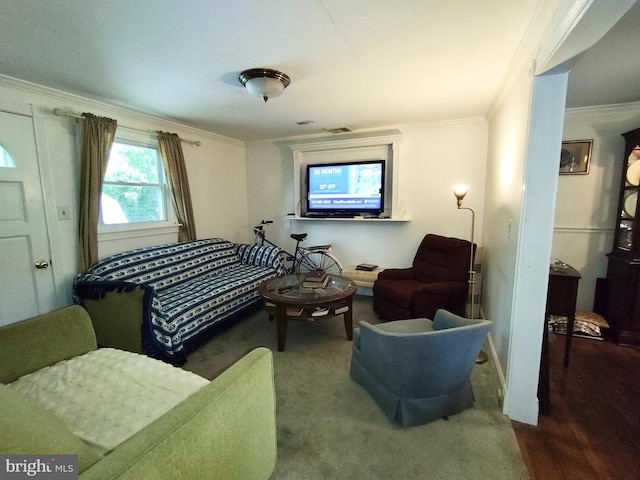 carpeted living room with crown molding