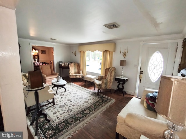 living room with crown molding and dark hardwood / wood-style flooring