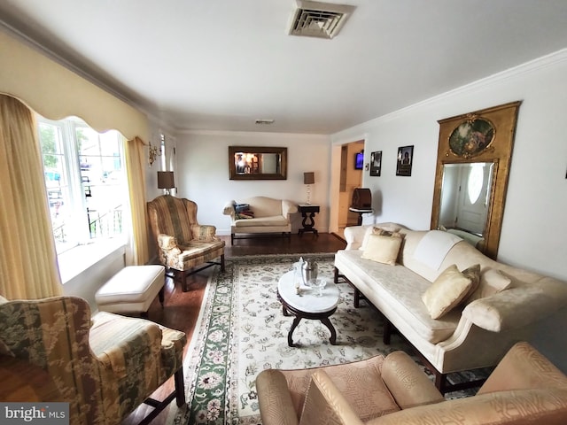 living room featuring crown molding and hardwood / wood-style floors