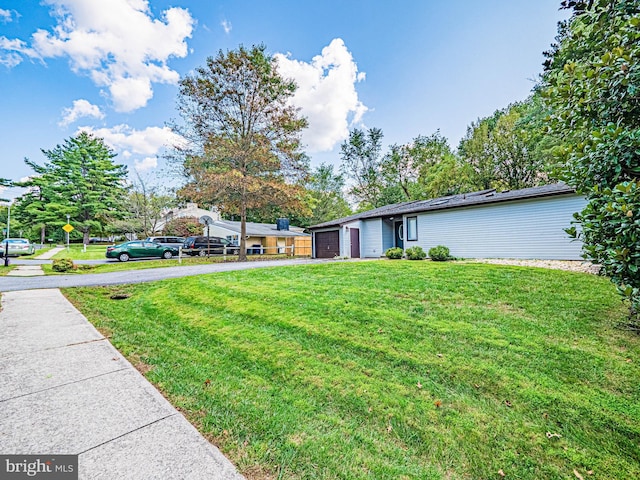 11512 Cherry Grove Dr, North Potomac, MD 20878 - view of yard with an attached garage and driveway