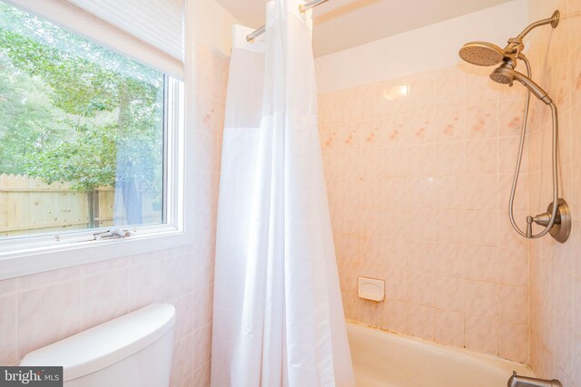 11512 Cherry Grove Dr, North Potomac, MD 20878 - full bathroom with toilet and shower / tub combo with curtain
