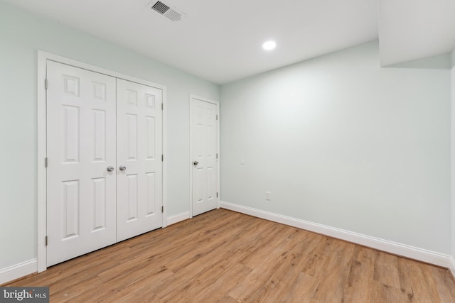 unfurnished bedroom featuring light hardwood / wood-style floors