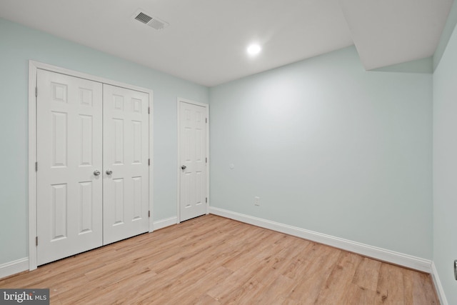 unfurnished bedroom with light hardwood / wood-style floors