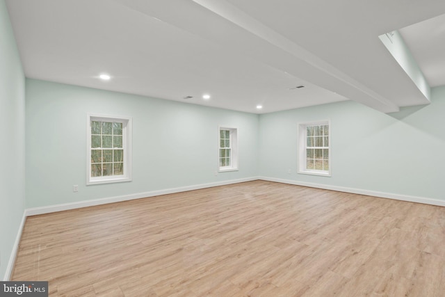 spare room with light wood-type flooring