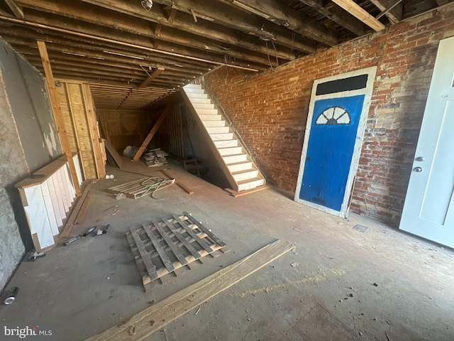 interior space with brick wall