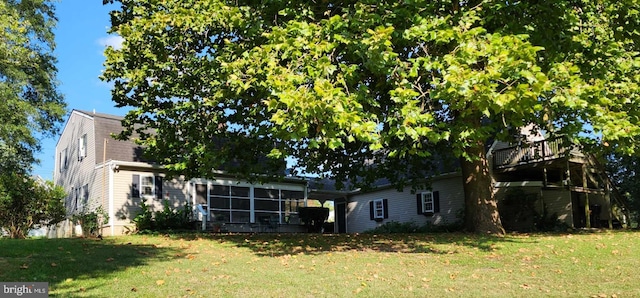 exterior space featuring a sunroom