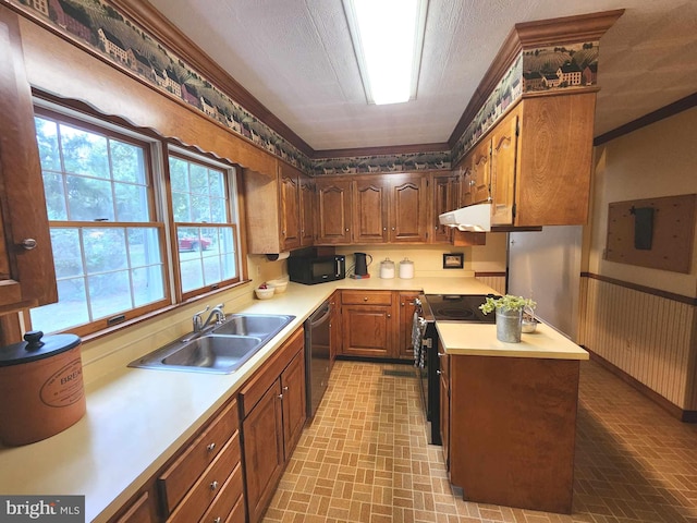 kitchen with black appliances, a textured ceiling, crown molding, and sink