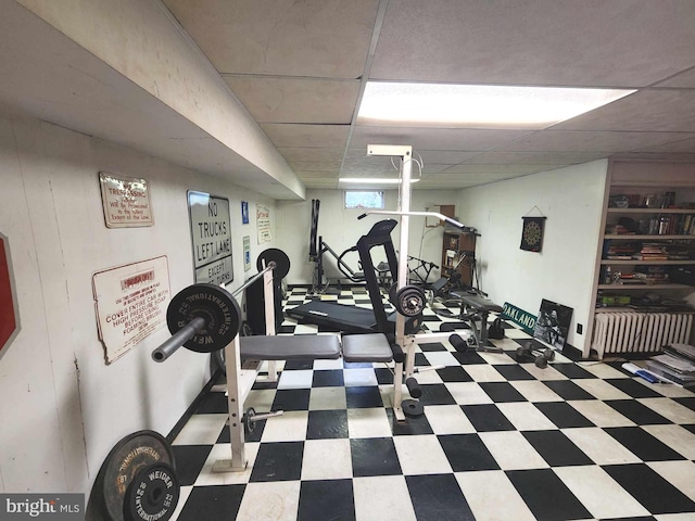 exercise area with a drop ceiling