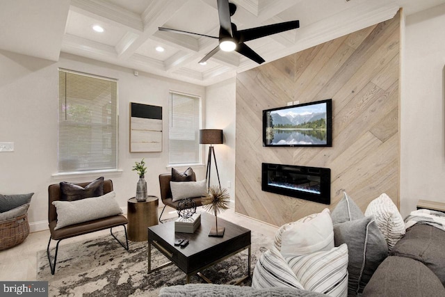 living room with ceiling fan, beam ceiling, wooden walls, coffered ceiling, and crown molding