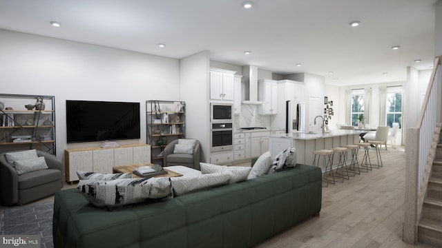 living room with light hardwood / wood-style floors