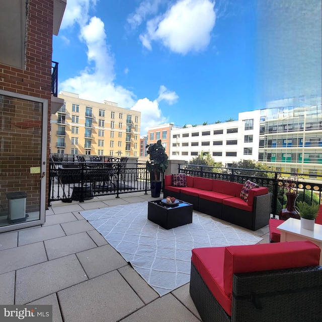 view of patio / terrace featuring a balcony and an outdoor hangout area