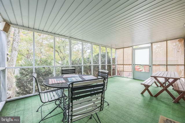 sunroom featuring a healthy amount of sunlight