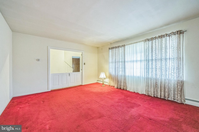 unfurnished room featuring carpet