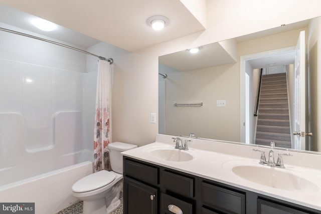 full bathroom with vanity, toilet, and shower / tub combo with curtain