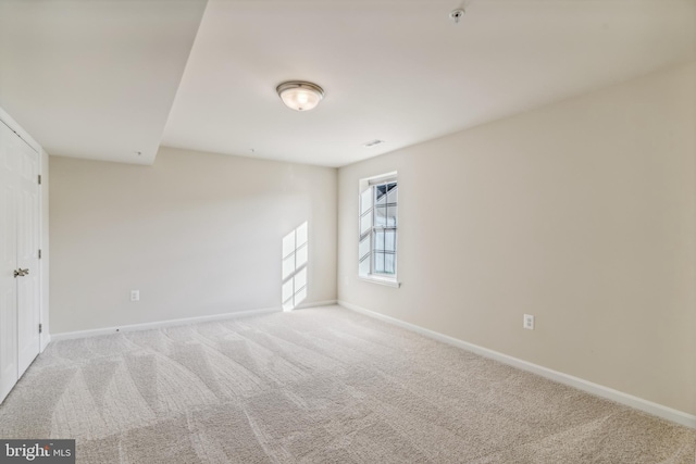 view of carpeted spare room