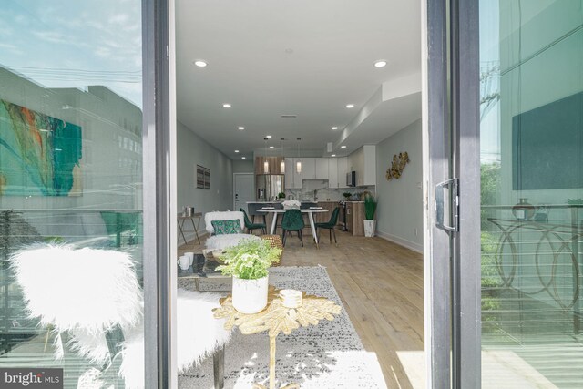 dining area with light hardwood / wood-style flooring